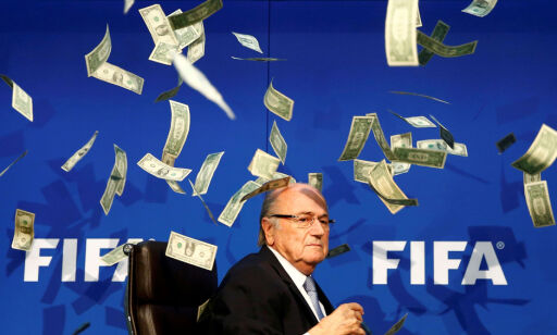 British comedian known as Lee Nelson (unseen) throws banknotes at FIFA President Sepp Blatter as he arrives for a news conference after the Extraordinary FIFA Executive Committee Meeting at the FIFA headquarters in Zurich, Switzerland July 20, 2015. REUTERS/Arnd Wiegmann/File Photo TPX IMAGES OF THE DAY